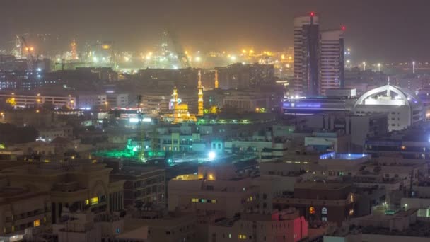 Widok z lotu ptaka na port Rashid oświetlony nocą podczas burzy piaskowej timelapse w Dubaju, Zjednoczone Emiraty Arabskie — Wideo stockowe