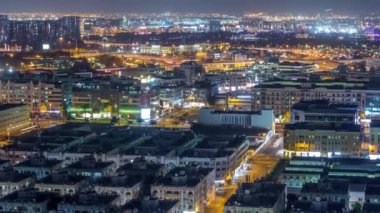 Tipik binalar gece timelapse ile mahalle Deira havadan görünümü, Dubai, Birleşik Arap Emirlikleri