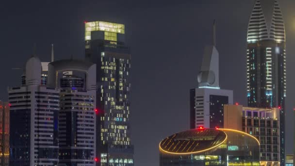 Skyscrapers aerial view in downtown and financial district Dubai night timelapse, United Arab Emirates — Stock Video