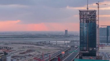 İnşaat altında finans merkezi yol sabah timelapse Sunrise havadan görünümü