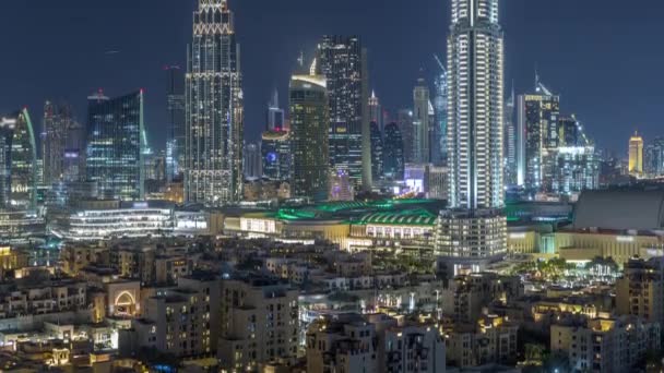 Aerial natten stadsbild med upplyst arkitektur i Dubai Downtown Timelapse, Förenade Arabemiraten. — Stockvideo
