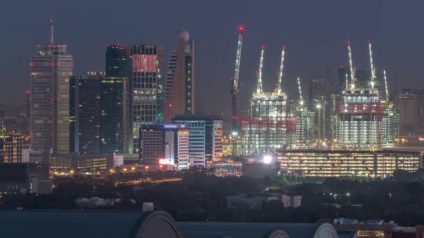 Cidade aérea com arquitetura do Dubai centro da noite a dia timelapse, Emirados Árabes Unidos . — Vídeo de Stock