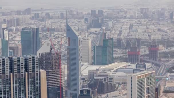 Downtown van Dubai in de ochtend timelapse na zonsopgang. Luchtfoto met torens en wolkenkrabbers — Stockvideo