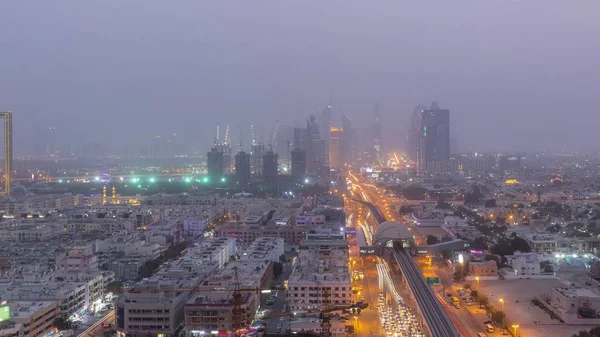 Dubai cityscape during sand storm day to night timelapse — Stock Photo, Image