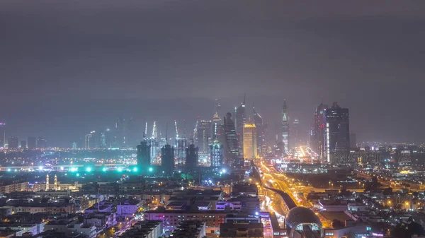 Dubai paisagem urbana durante a tempestade de areia noite timelapse — Fotografia de Stock