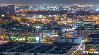 Tipik binalar gece timelapse ile mahalle Deira havadan görünümü, Dubai, Birleşik Arap Emirlikleri