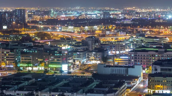 Vista aérea del barrio Deira con edificios típicos night timelapse, Dubai, Emiratos Árabes Unidos — Foto de Stock