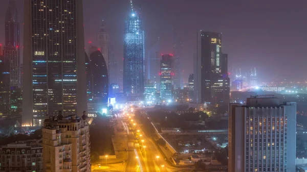 Міські обрії Дубая на ніч на день повітряні перевезення — стокове фото
