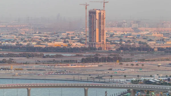 Construction and intersection near Dubai Creek Harbor aerial timelapse. Dubai - UAE.
