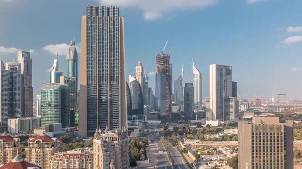 Aerial view on downtown and financial district in Dubai timelapse, United Arab Emirates with skyscrapers and highways. — Stock Photo, Image