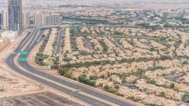 Luchtfoto van appartementen huizen en villa's in Dubai City timelapse, Verenigde Arabische Emiraten — Stockvideo