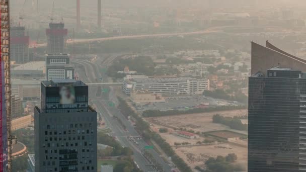 Vista aérea para financeiro e zabeel distrito timelapse com tráfego e em construção edifício com guindastes do centro da cidade — Vídeo de Stock