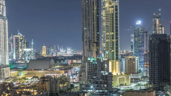 Beautiful skyline of Dubai downtown and Business bay with modern architecture night timelapse. — Stock Photo, Image