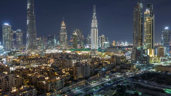 Dubai Downtown skyline noite timelapse com Burj Khalifa e outras torres vista panorâmica do topo em Dubai — Fotografia de Stock