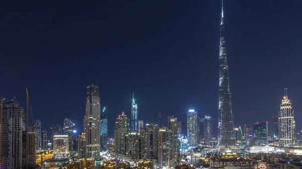 Dubai Downtown skyline durante toda a noite timelapse com Burj Khalifa e outras torres vista panorâmica do topo em Dubai — Fotografia de Stock