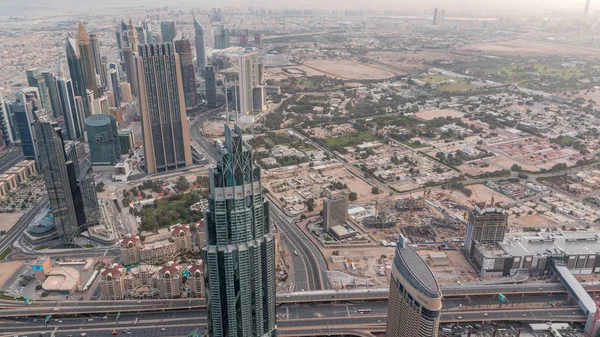 Downtown of Dubai in the morning timelapse after sunrise. Aerial view with towers and skyscrapers — Stock Photo, Image