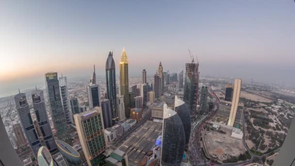 Şeyh Zayed Road ve Difc havadan dubai, Bae gece timelapse binaların Silueti. — Stok video