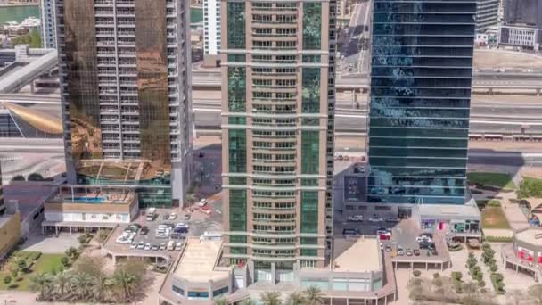 Lakossági apartmanok és irodák a Jumeirah-tó tornyok kerületi TimeLapse Dubaiban — Stock videók