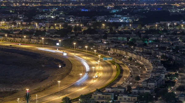 Vista aérea a villas y casas con campo de golf noche timelapse — Foto de Stock