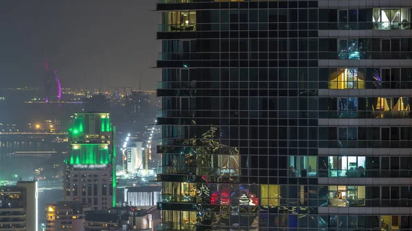 Modern felhőkarcolók Jumeirah Beach Residence Dubai, JBR légi éjszaka TimeLapse — Stock Fotó