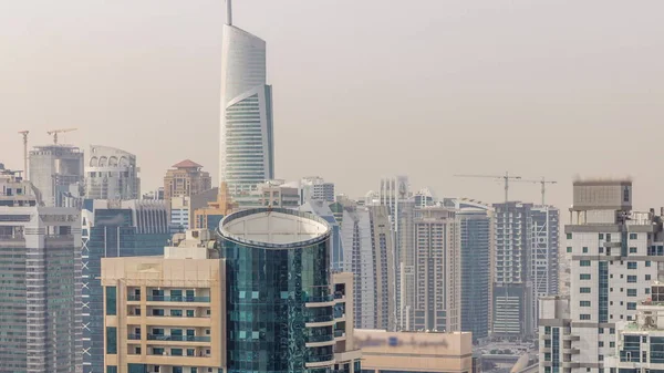 Aerial top view of Dubai Marina morning timelapse. Modern towers and traffic on the road — Stock Photo, Image