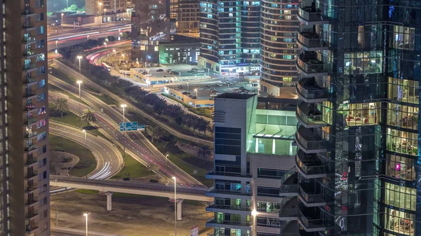 Aerial view of a road intersection in a big city night timelapse. — Stock Photo, Image