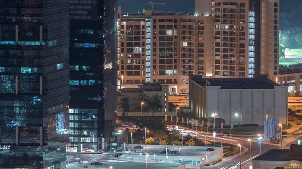 Jumeirah Lake Towers residential district aerial night timelapse near Dubai Marina — Stock Photo, Image