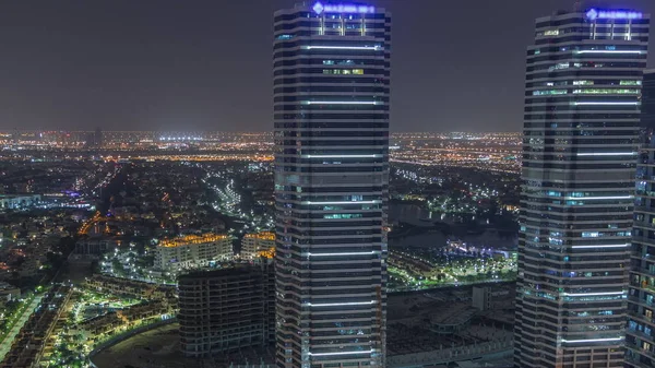 Jumeirah Lake Towers residential district aerial night timelapse near Dubai Marina — Stock Photo, Image