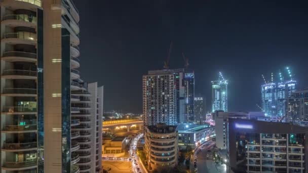 Dubai Marina skyscrapers and promenade aerial night timelapse, Dubai, United Arab Emirates — Stock Video
