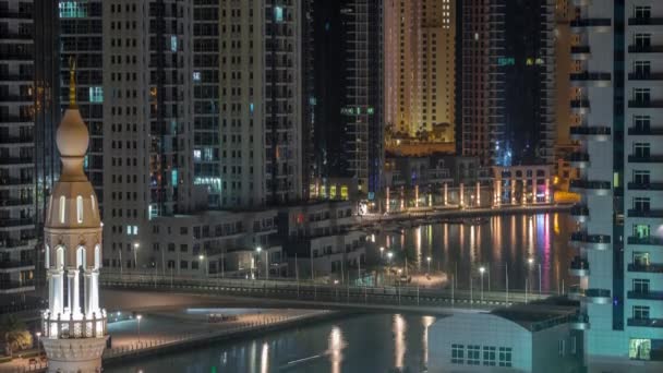 Dubai Marina skyscrapers and promenade aerial night to day timelapse, Dubai, United Arab Emirates — стоковое видео