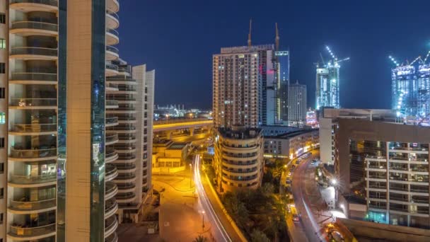 Dubai Marina skyscrapers and promenade aerial night to day timelapse, Dubai, United Arab Emirates — Stock Video