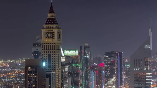 Skyline budynków Sheikh Zayed Road i DIFC antenowe nocne timelapse w Dubaju, ZEA. — Zdjęcie stockowe