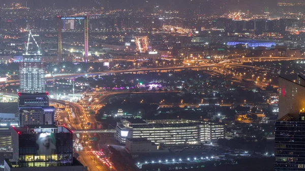 Vista aérea para financeiro e zabeel distrito noite timelapse com tráfego e em construção edifício com guindastes do centro da cidade — Fotografia de Stock