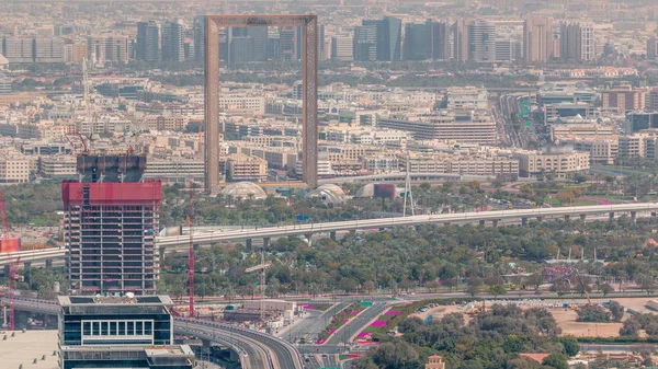 Vista aérea para financeiro e zabeel distrito timelapse com tráfego e em construção edifício com guindastes do centro da cidade — Fotografia de Stock