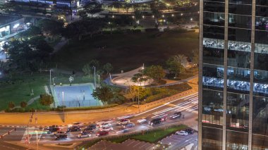 Dubai'de Jumeirah göl kuleleri ilçe gece timelapse konut ve ofis binaları