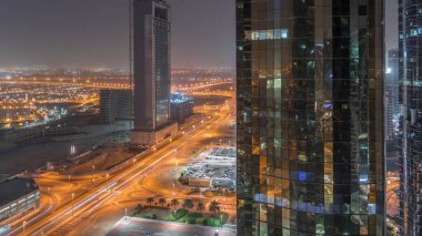 Dubai'de Jumeirah göl kuleleri ilçe gece timelapse Ofis binaları