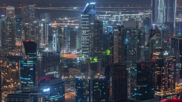 Panoramische luchtfoto van Business Bay Towers in Dubai Night timelapse. — Stockfoto