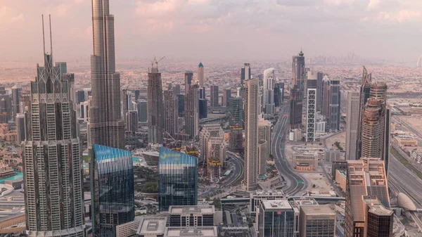 Dubai Downtown skyline futuristic cityscape with many skyscrapers and Burj Khalifa aerial timelapse. — Stock Photo, Image