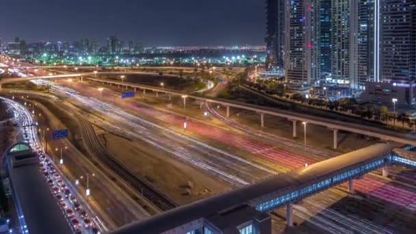 Flygfoto över Sheikh Zayed Road nära Dubai Marina och Jlt timelapse, Dubai. — Stockvideo