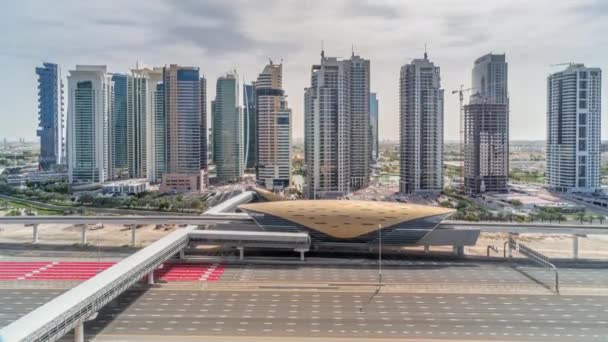 Aerial top view to Sheikh Zayed road from Dubai Marina with JLT skyscrapers timelapse during all day, Dubai. — Stock Video