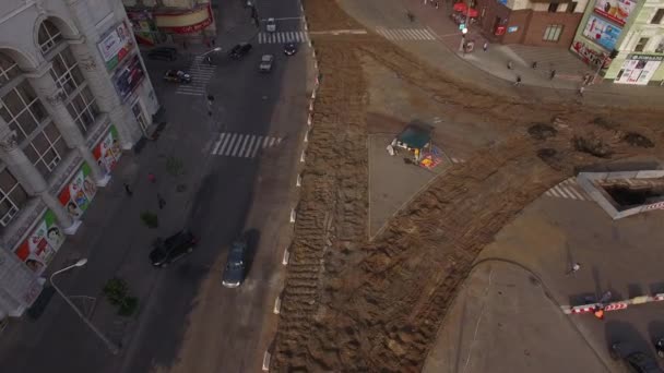 Road reconstruction with tram rails intersection, construction site — Stock Video