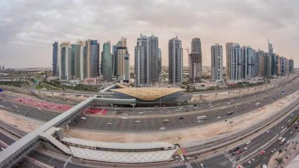 Letecký pohled shora na Sheikh Zayed silnice v blízkosti Dubai Marina a Jlt den na noc timelapse, Dubaj. — Stock video