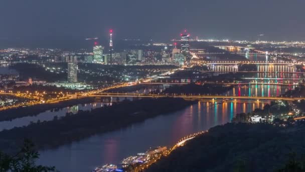 Skyline of Vienna from Danube Viewpoint Leopoldsberg aerial night timelapse. — 비디오