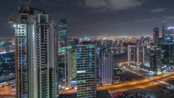 Dubais business bay towers air night timelapse . — стоковое видео