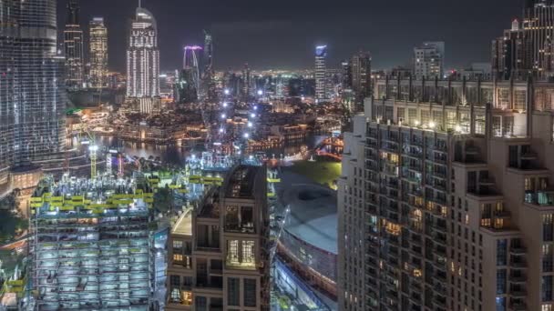 Verbazingwekkende luchtfoto van Dubai Downtown wolkenkrabbers Night timelapse, Dubai, Verenigde Arabische Emiraten — Stockvideo