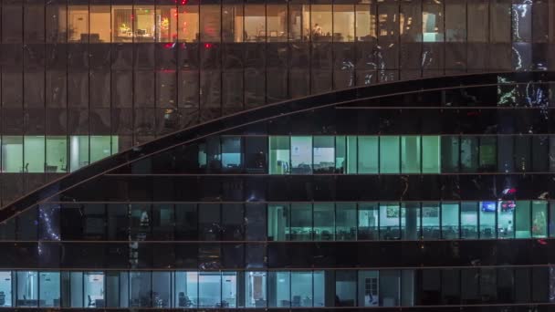 Luchtfoto van lichten vanuit ramen van kantoren in Dubai Luchtfoto Timelapse — Stockvideo