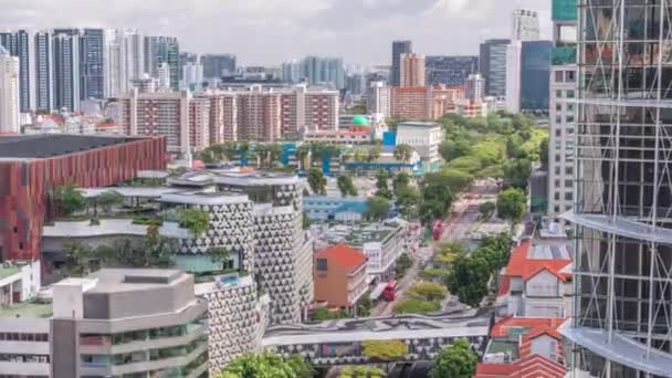 Singapore skyline with Victoria street and National Library aerial timelapse. — Stok Video