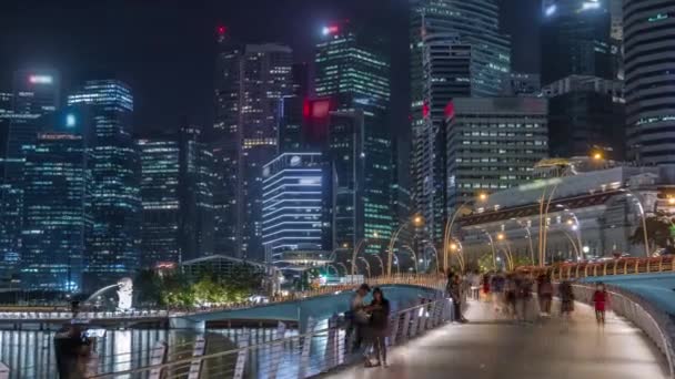 Puente de la explanada y rascacielos del centro de la ciudad en el fondo Singapur noche timelapse — Vídeos de Stock