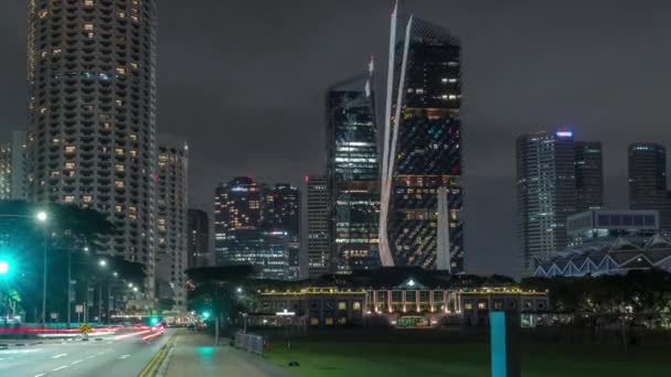 Skyline med Singapore fritidsklubb och skyskrapor på bakgrundsnatt timelapse hyperlapse — Stockvideo