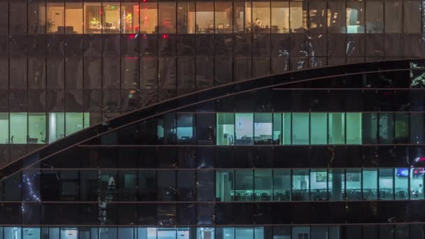 Luchtfoto van lichten vanuit ramen van kantoren in Dubai Luchtfoto Timelapse — Stockvideo